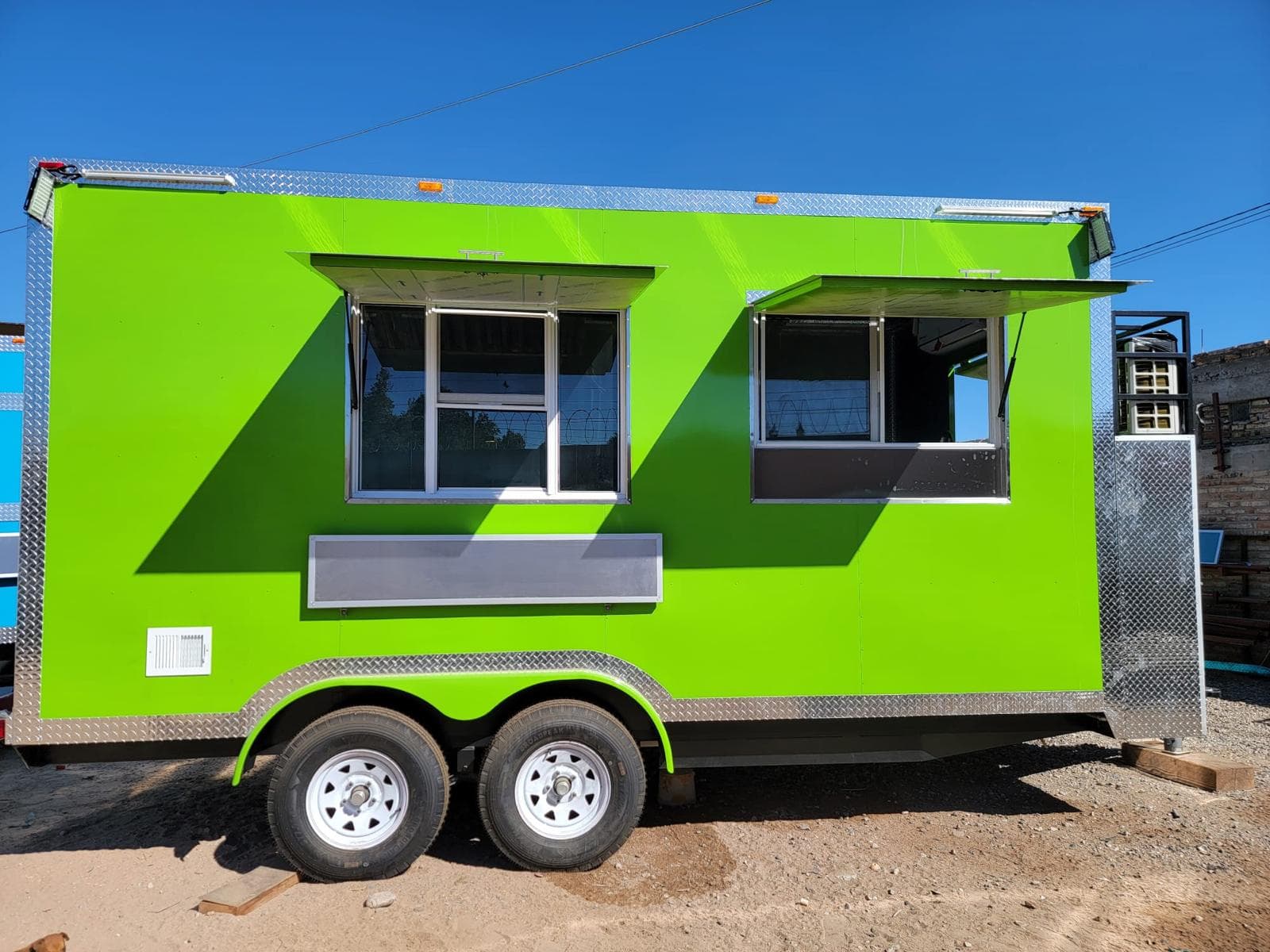 8 by 16 foot custom food trailer, exterior three-quarter view